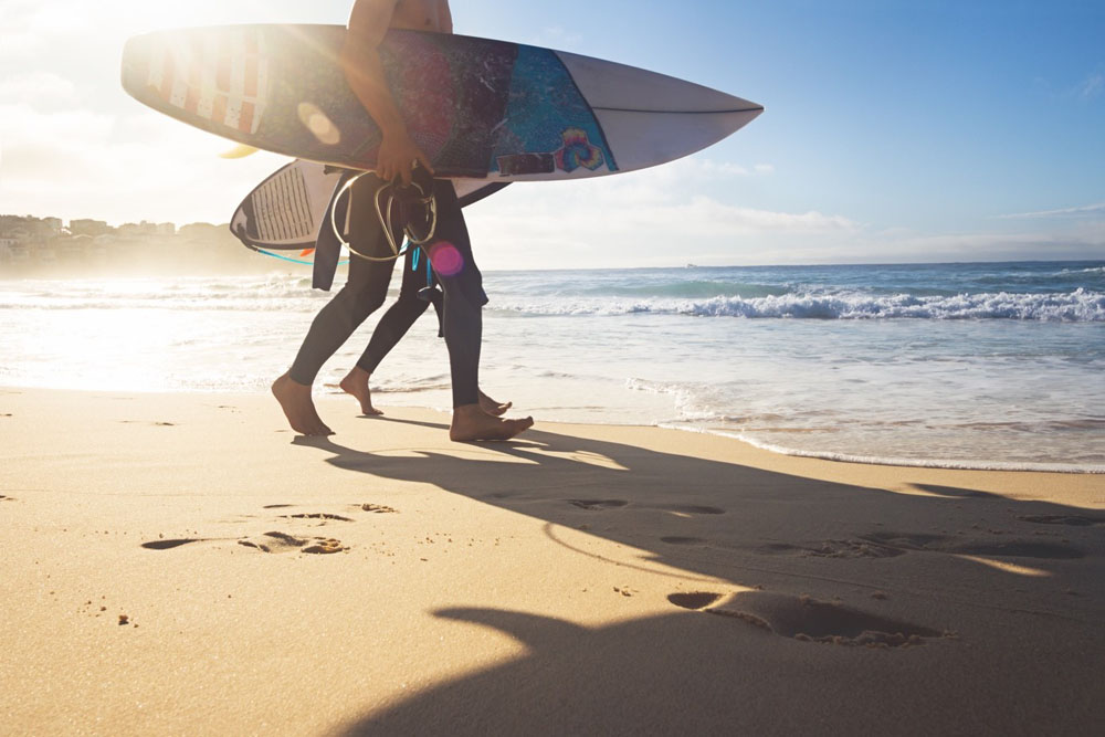 Surfer am Strand